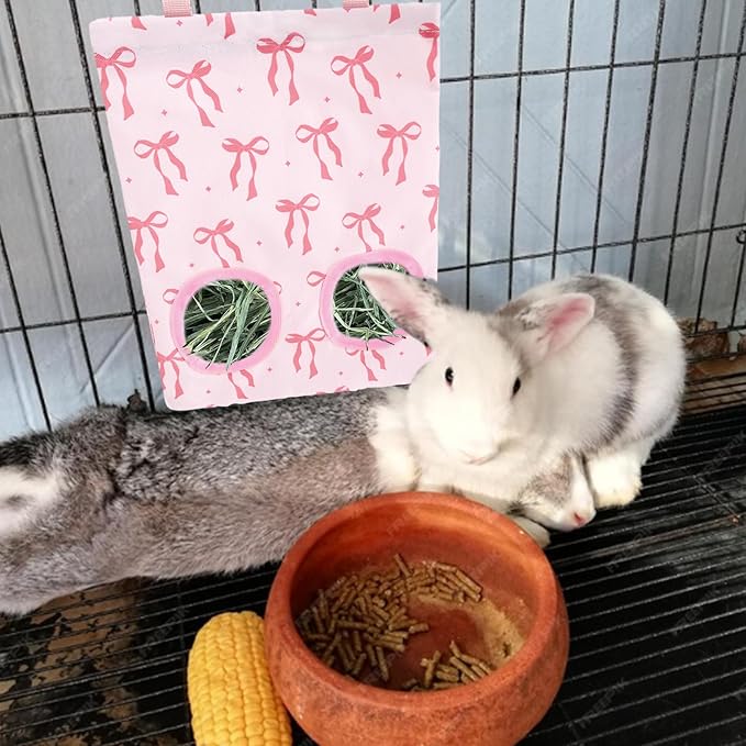JarThenaAMCS 2Pcs Rabbit Hay Feeder Bag with 2 Holes Pink Bow Guinea Pig Hanging Hay Feeding Bag Storage Dispenser for Chinchilla Hamster Bunny Small Animal Pet