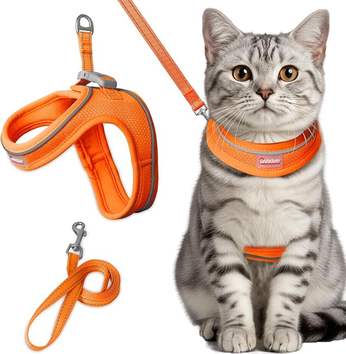 Cat Harness and Leash Set,Escape Proof Kitten Harness,Step in Adjustable Soft Lightweight,Easy Control,Reflective Strips Comfortable for Walking Travel(Orange,XS)