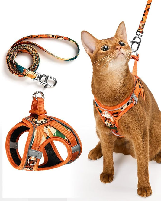 PetThem Upgraded Cat Harness and Leash Set - Step-in Escape Proof Adjustable Cat Harness, Comfortable Soft Lightweight, Reflective Harness for Walking, Travel, Camping (King of The Jungle, L)